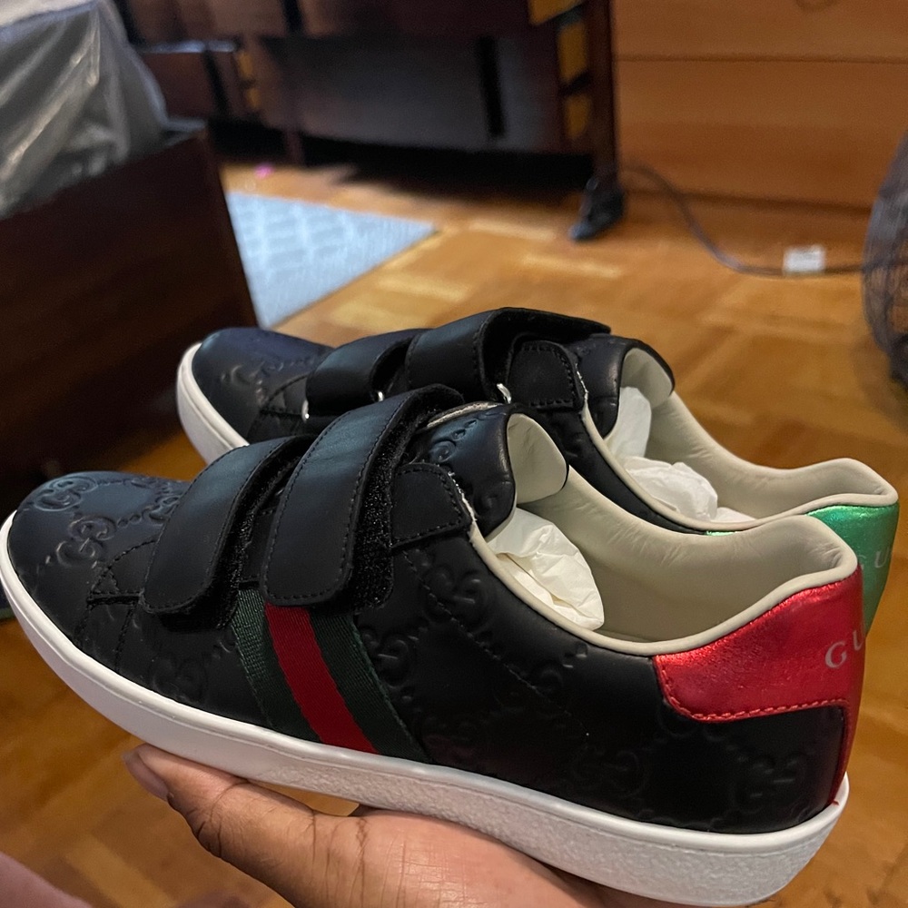 Authentic kids Gucci Black with red and green stripes sneakers.